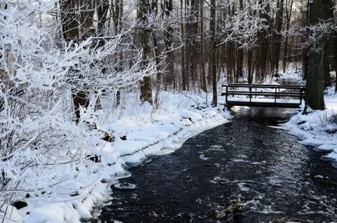 Footbridge at a small river Stock Photos