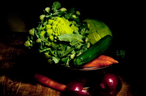 Footed plate with vegetables Stock Photos