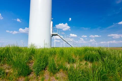Foothill with door of windmill, wind generators, turbines Stock Photos