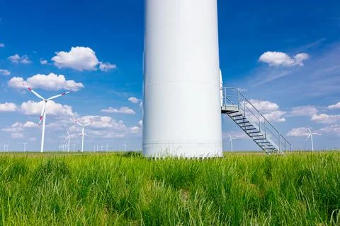 Foothill with door of windmill, wind generators, turbines Stock Photos