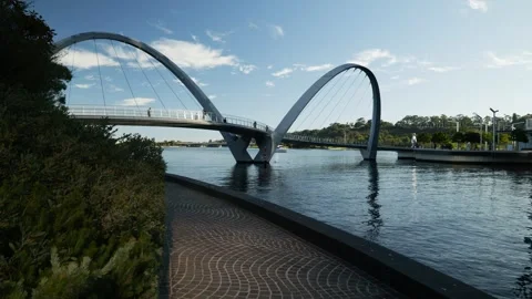 Footpath next to Swan River and Elizabeth Quay Bridge in Perth 6K Video stock 312087435