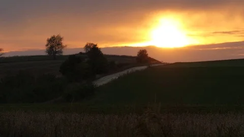 Footpath Through Field Splendid Sundown Silhouettes of Beautiful Evening Stock Footage 71633524