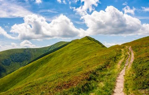Footpath through the mountain ridge Stock Photos
