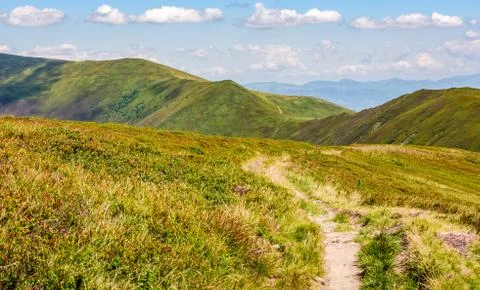Footpath through the mountain ridge Stock Photos