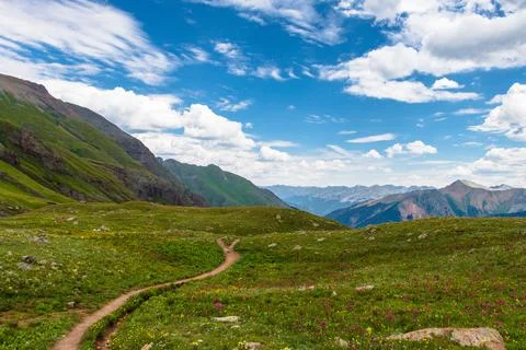 A footpath trail through the mountain wilderness in Colorado Stock Photos