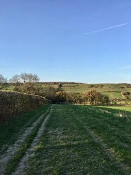 Footpath on the village Stock Photos