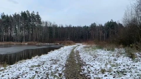 Footpath. Winter landscape on a pond. Ice on lake. 스톡 동영상 146312451