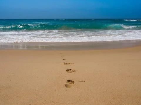 Footprint on the beach Stock Photos