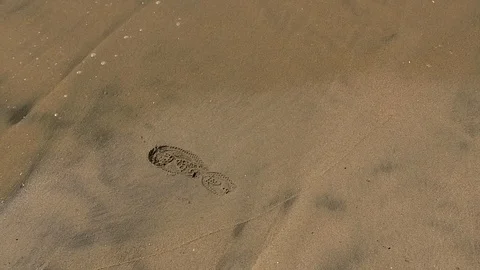 Footprint in Beach Sand Stock Footage 126940995