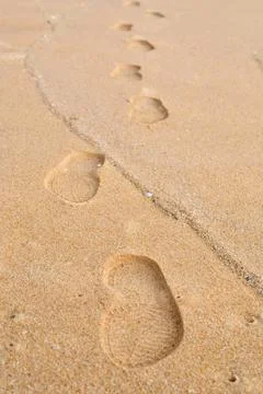 Footprint on a sand Stock Photos