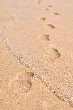 Footprint on a sand Stock Photos