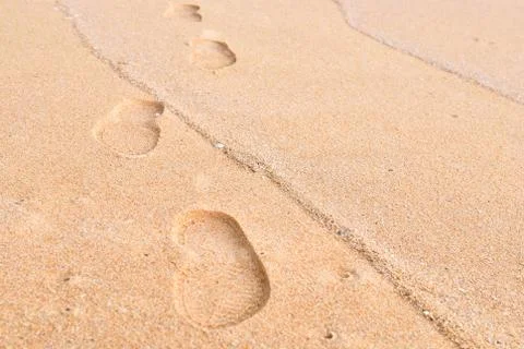 Footprint on a sand Stock Photos