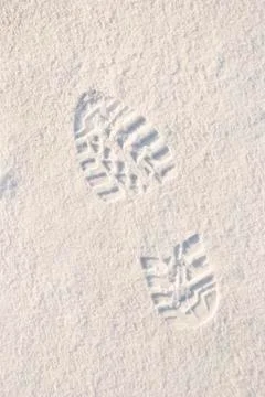 Footprint in snow Stock Photos