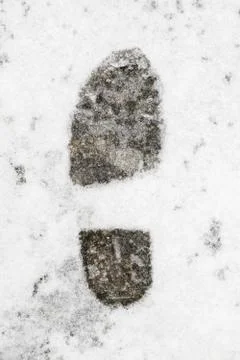 Footprint in snow Stock Photos
