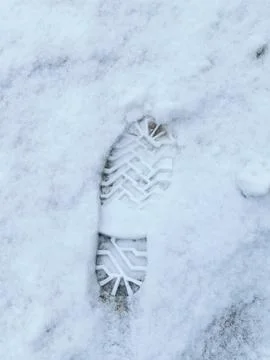 Footprint in snow Stock Photos