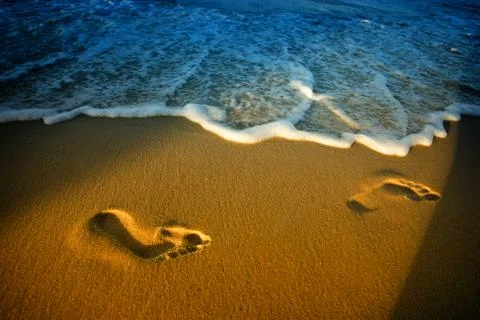 Footprints on beach Stock Photos