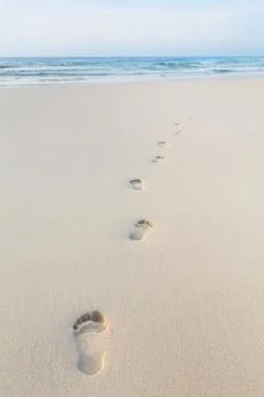 Footprints on beach Stock Photos