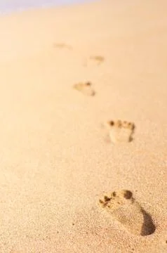 Footprints on the beach Stock Photos