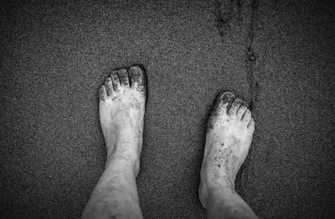 Footprints on the beach Stock Photos