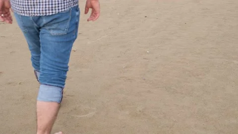 Footprints beach sand Stock Footage 168392990