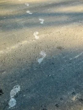 Footprints on concrete surface Stock Photos