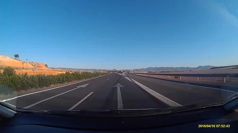 Footprints of a recent hevy breaking on the highway viewed from a car. Vidéo 102331295