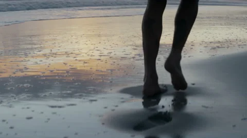 Footprints in sand at dawn Stock Footage 169256835