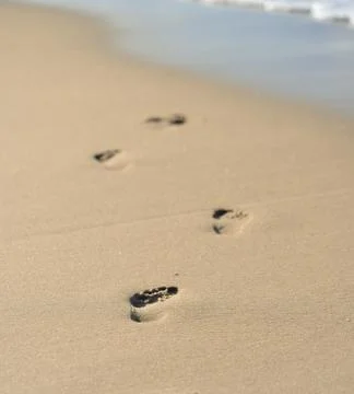 Footprints in the sand Stock Photos