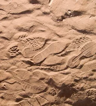Footprints in sand Foto stock