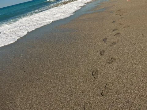 Footprints in the sand Stock Photos