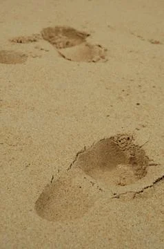 Footprints in the sand Stock Photos