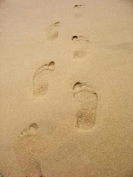 Footprints in sand Stock Photos