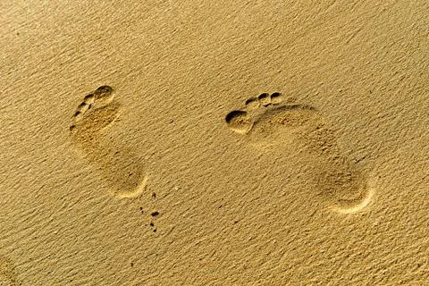 Footprints in sand Foto stock