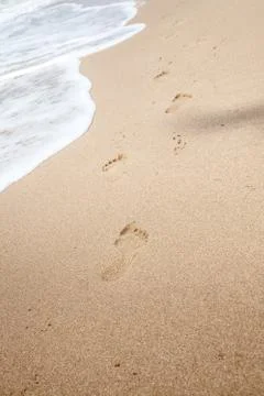 Footprints in the sand Stock Photos