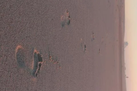 Footprints on the sand Stock Photos