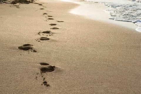 Footprints on the sand Stock Photos