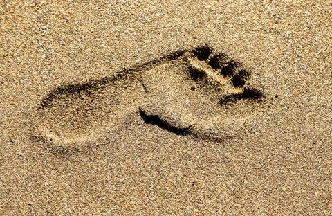 Footprints in the sand Stock Photos