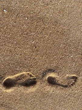 Footprints in the sand Stock Photos