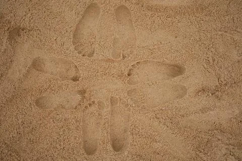 Footprints at a sandy beach Stock-Fotos