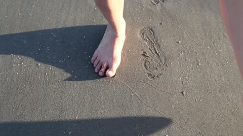 FOOTPRINTS IN THE SEA Stock Footage 67640716