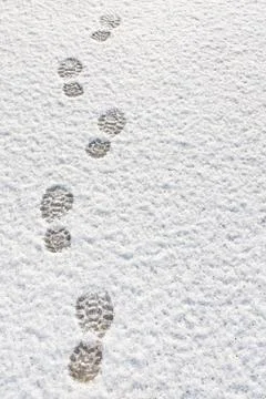 Footprints in the snow background Foto stock