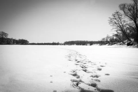 Footprints in the snow Stock Photos