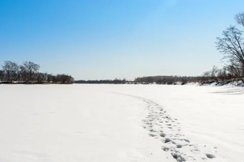 Footprints in the snow Stock Photos