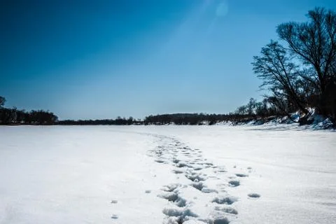 Footprints in the snow Stock Photos