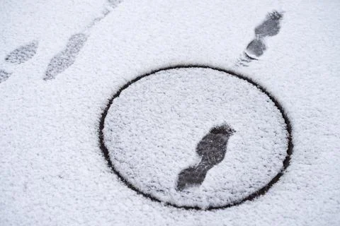 Footprints in the snow Stock Photos