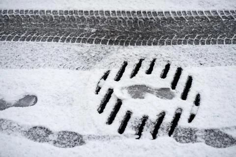 Footprints in the snow Stock Photos