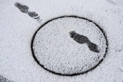 Footprints in the snow Stock Photos