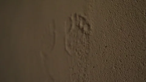 Footprints on wall Video stock 89343214
