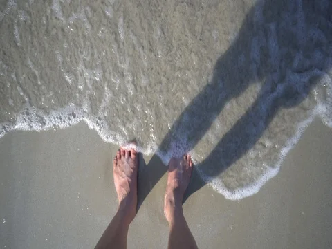 Foots on Sand in beautiful beach Stock Footage 73398601