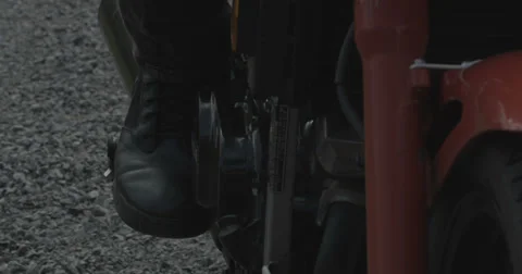 Footstart Motorcycle With Black Boot Stock Footage 31154787